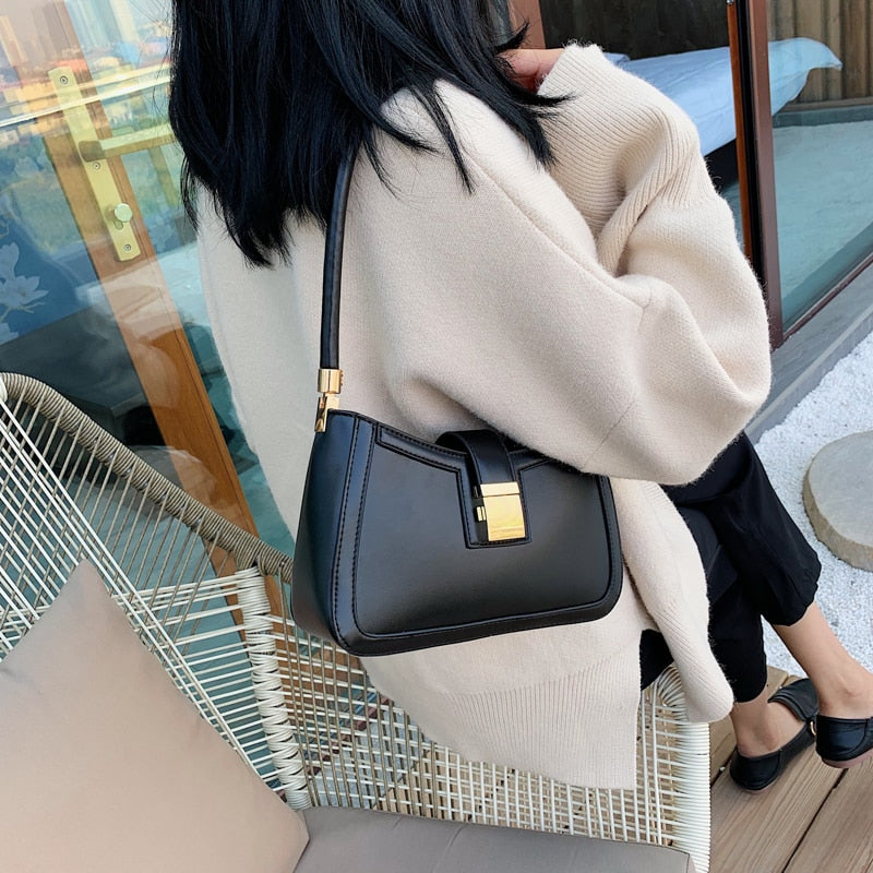 Damen Schultertasche mit Reißverschluss in Schwarz Jully