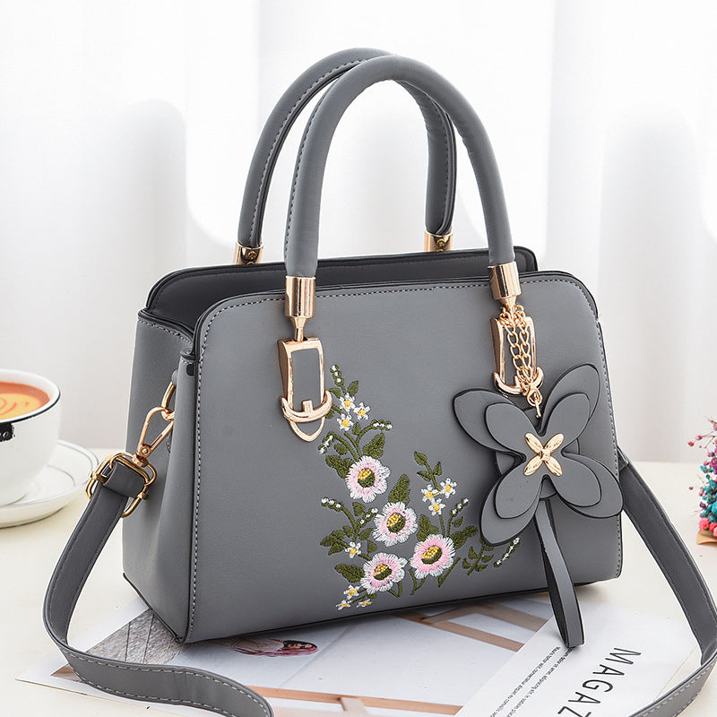 Damen Umhängetasche mit Blumenstickerei aus PU Jully